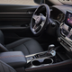 A photo of the driver seat and steering wheel in the new Nissan Altima.
